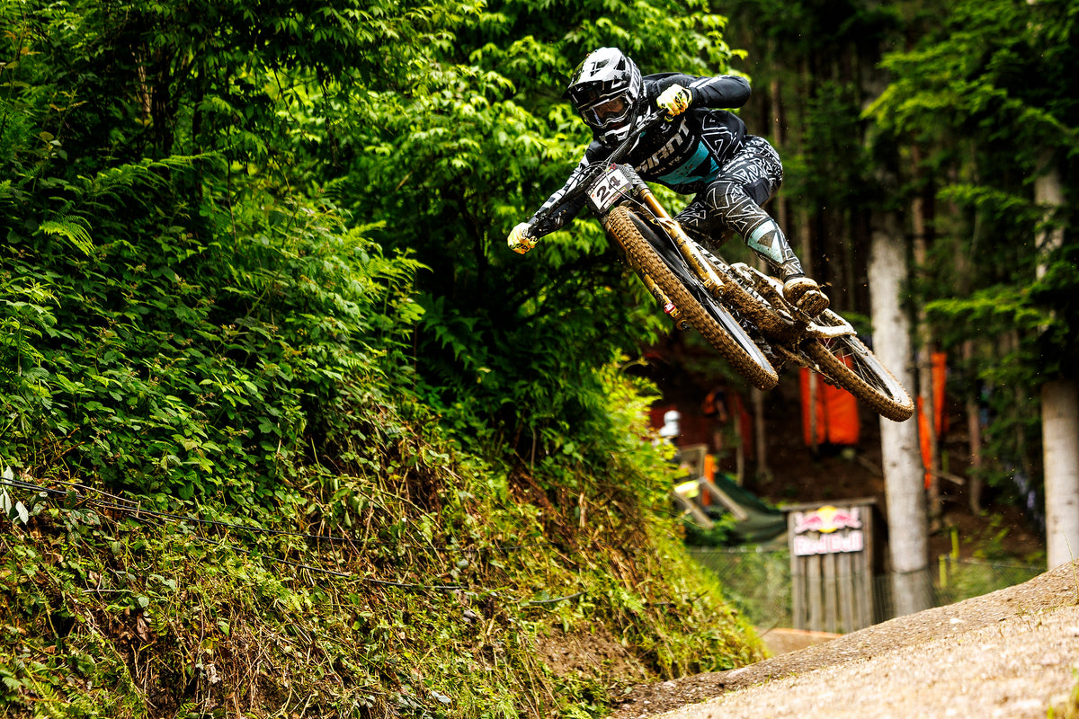 Man on a mountain bike in mid air